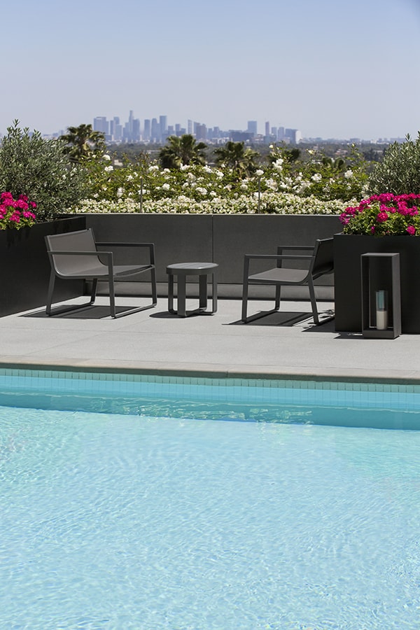 Outdoor Pool with Lounge Chairs Overlooking West Hollywood